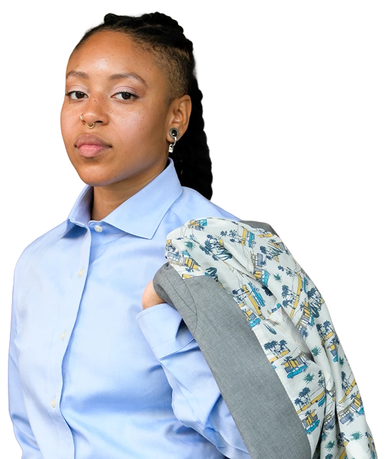 A portrait of Octavia Carson in a blue shirt and gray jacket, exuding confidence and warmth